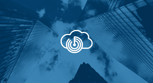 Looking up at a few skyscrapers with a cloud icon in the middle.